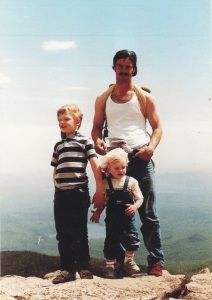 A younger me with dad and sister atop West Rattlesnake Mountain, New Hampshire. 